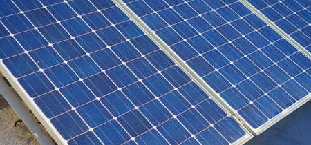 solar panel with sunlight and blue sky background. concept clean energy power in nature