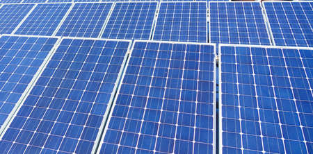 solar panel with sunlight and blue sky background. concept clean energy power in nature