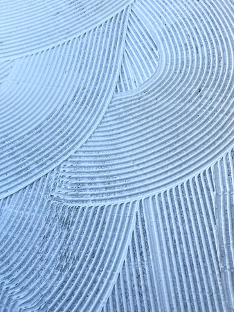 cementitious adhesive applied to the floor ready to receive the ceramic tileの写真素材