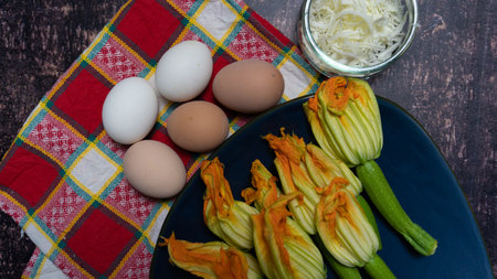 fresh zucchini flowers ready to be fried, typical italian foodの写真素材