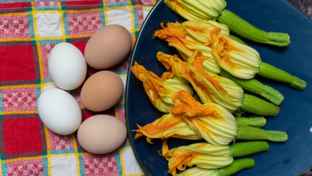 fresh zucchini flowers ready to be fried, typical italian foodの写真素材