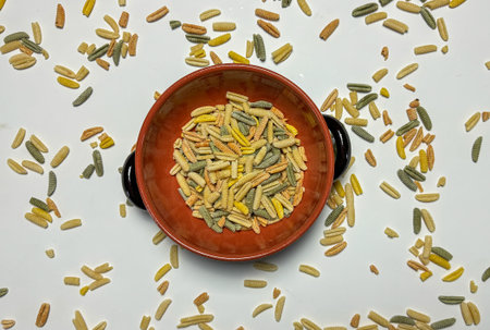 malloreddus or Sardinian gnocchetti, typical Sardinian pasta, with wild boar sauce, basil and...