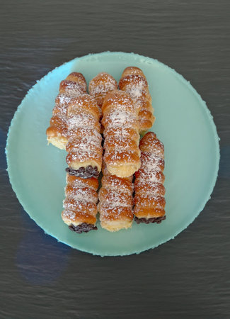 cream puff pastry cannoli - typical Italian festive dessert