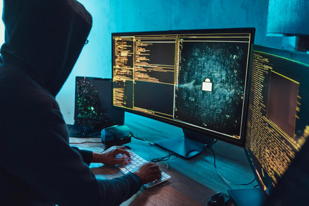 Hacker launching global cyberattack from laptop in server room, targeting world map network