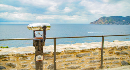 Public binocular viewer facing the sea in Corniglia, Cinque Terre, Liguria, Italy.の写真素材