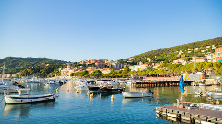 View of Lerici Castle and colorful village with boats docked in the harbor.の写真素材