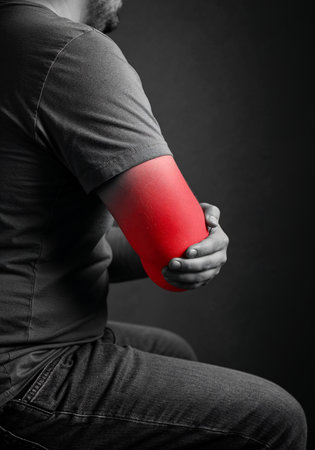 Arm tendon inflammation in male anatomy showing tendinitis of forearm musclesの写真素材