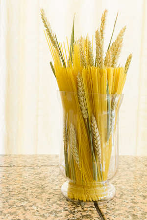 A variety of types and shapes of dry pastaの写真素材