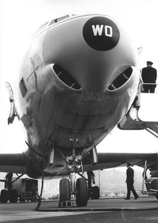 airplane makes a stop at the airport Cristoforo Colombo in Genoa (70 -80)のeditorial素材