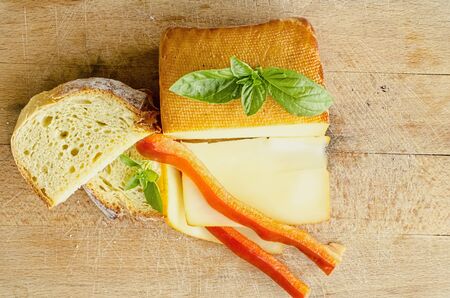 Smoked full fat cheese, a couple of slices and piece, healthy homemade bread, fresh red pepper and...