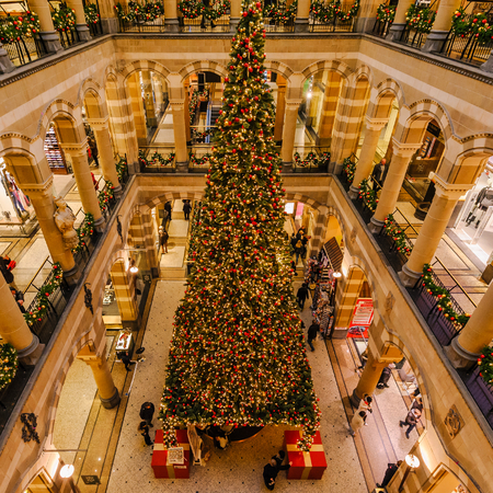AMSTERDAM, THE NETHERLANDS - DEC 11, 2011: Every year a gigantic christmas tree can be seen in the middle of this beautiful shopping center (close to the Royal Palace in Amsterdam).のeditorial素材