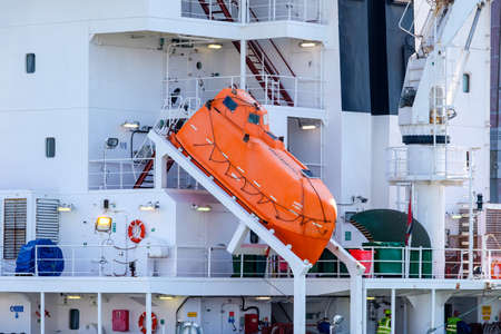 Free-fall lifeboat on a sea container ship. The Port of Rotterdam, the Netherlands.のeditorial素材