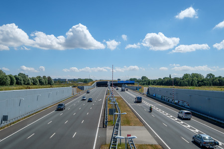 Modern deepened Highway A4, leading into a tunnel under the urban area close to Rotterdam...