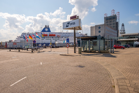 Ferry terminal at the harbor of IJmuiden, Netherlands. Ferry is almost ready to leave for Newcastle, UK. Trucks are waiting to get shipped.のeditorial素材