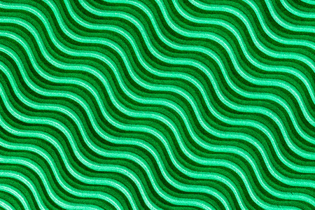 Wavy lines with light and shadows in green corrugated cardboard.