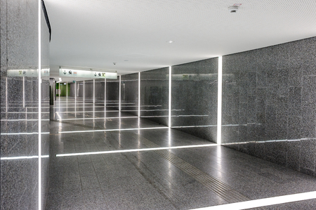 Modern corridor with impressive light at the airport at Vienna, Austriaのeditorial素材