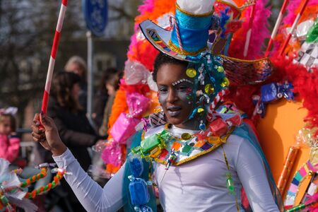 Carnival, a parade with cheerful people in funny clothes and loud music marches through the streets of Delft, the Netherlands.のeditorial素材