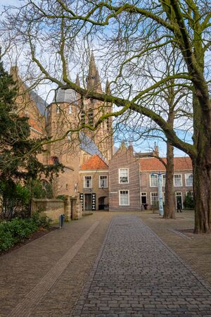 The Agathaplein next to the Prinsenhof in Delft, the Netherlands with a view of the leaning tower of...