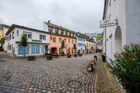 Street with cobblestones in the historic town of Saarburg, Germany. Not many tourists on the street...