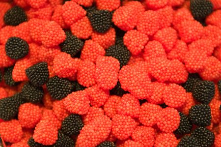 Red and black candies backgroundの写真素材