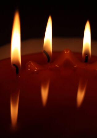 Candle with reflectionの写真素材