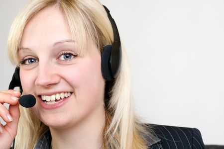 Call Center Agent having a telephone callの写真素材