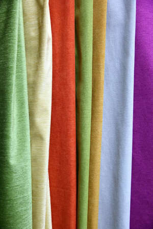 Colorful fabric is used for clothes, for women and men.