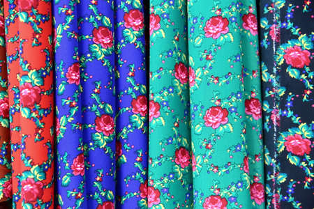 Colorful fabric is used for clothes, for women and men.