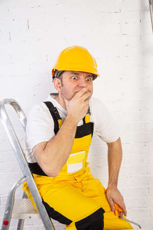 A big problem to solve during painting. Despite physical work, thinking is essential to doing the right job.の写真素材