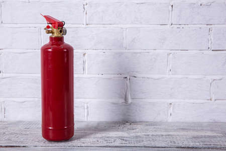 A fire extinguisher is a preventive measure necessary in areas of fire.の写真素材