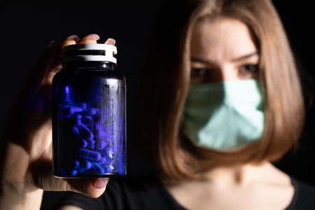 Modern tablet for pain and infectious disease developed by a fashion apprentice from medicine.の写真素材
