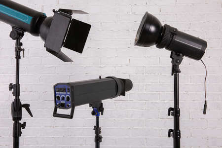 A studio flash fires a lot of light at a time when shooting.