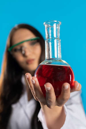 A young woman developed a base for a drug for COVID-19.の写真素材