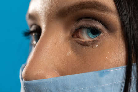 The doctor shed a tear after the death of a patient who passed away so young.