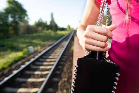 A handbag always accompanies every woman, and a trip and vacation is a unique opportunity to take it with you.の写真素材