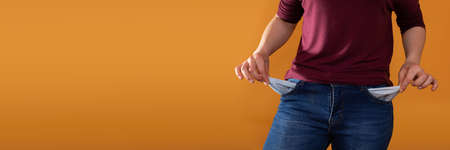 Panoramic view in the frame. The poor girl checks her pockets to see if she has any money left that...