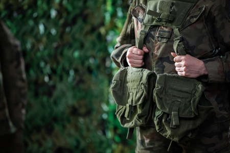 Portrait of a woman in military uniform. Equipping the Polish Army with multipurpose groups.