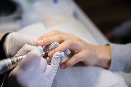 Woman uses the services of a professional beauty salonの写真素材