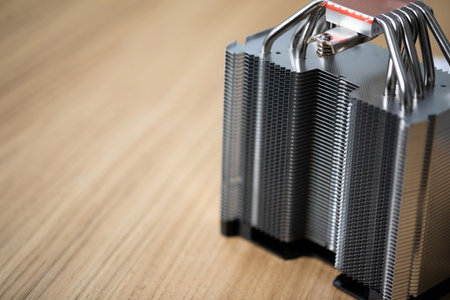 Computer equipment standing on a brown wooden tableの写真素材