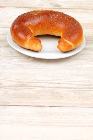Savor the delightful experience of freshly baked bread beautifully displayed on a plateの写真素材