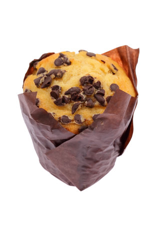 Savor the Delight of a Delicious Chocolate Chip Muffin Carefully Wrapped in Brown Paperの写真素材