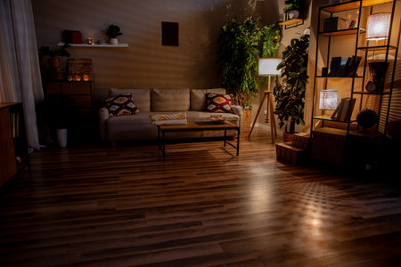 A Cozy Living Room Featuring Modern Decor, Inviting Warm Lighting, and a Relaxing Atmosphereの写真素材