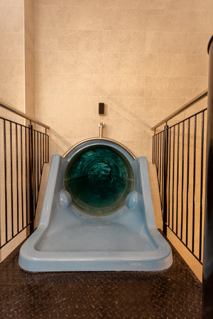 The Vibrant and Colorful Water Slide at the Indoor Recreational Center for All Ages