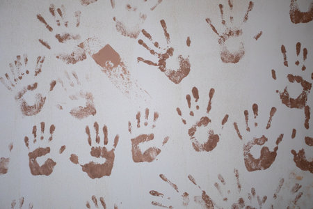 Ancient handprints can be seen on cave walls as unique forms of artistic expression in historyの写真素材
