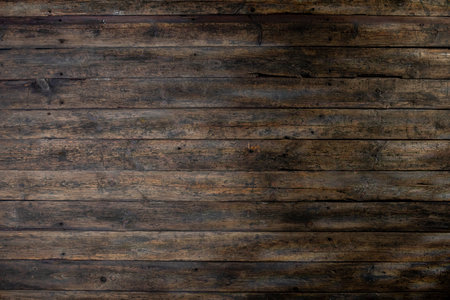 A Beautiful Textured Dark Wooden Surface Ideal for Inspiring Creative Backgrounds