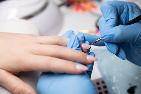 Skillfully applied professional nail art services provided by a trained technician expertの写真素材