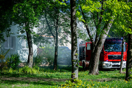 A Fire Truck is Responding Urgently to an Emergency Situation in a Residential Area