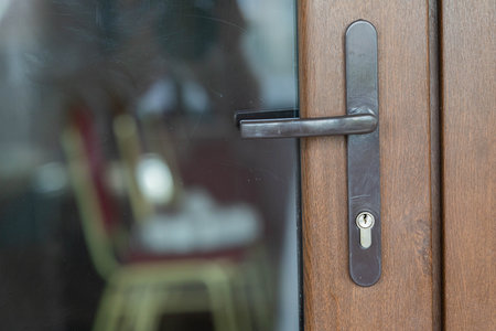 This is a Modern Door Handle featuring an Elegant Design that enhances any home entranceの写真素材