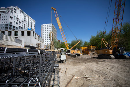 The process of Development on Construction Sites Involving Various Machinery and Equipment