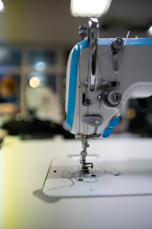 A CloseUp View of a Sewing Machine at Work, Showcasing Its Intricate Mechanisms in Actionの写真素材